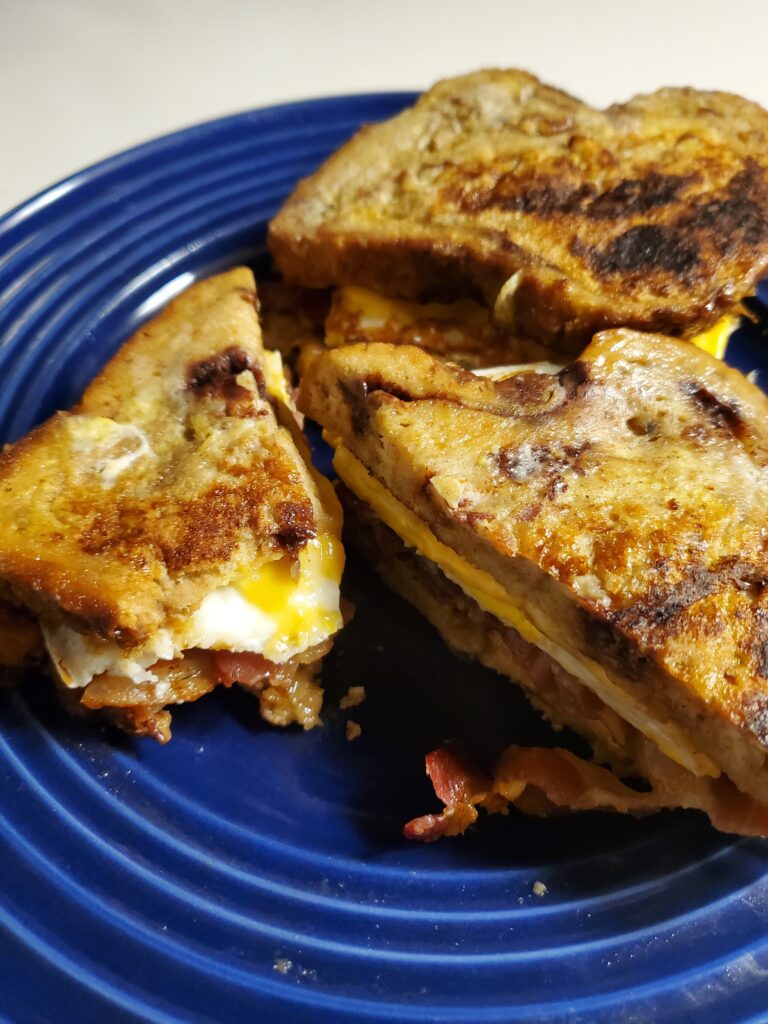 Cinnamon-Raisin French Toast Egg&Cheese Sammies w/caramelized Bacon